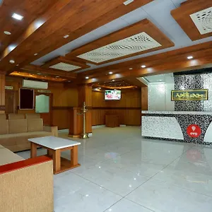 Capital O Kovilakam Residency Hotel