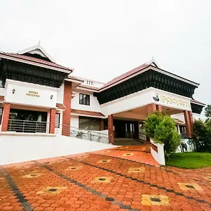 Capital O 47329 Pooram Residency Hotel